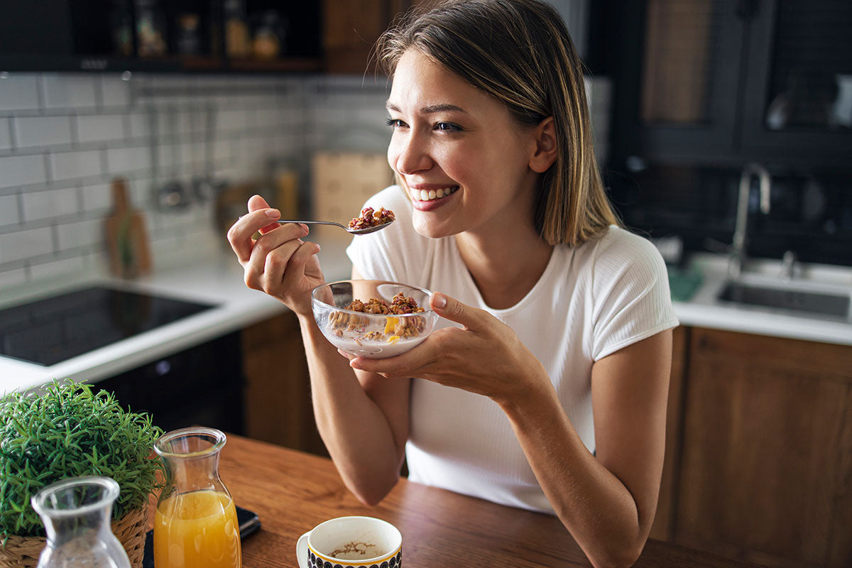 A woman taking a healthy breakfast