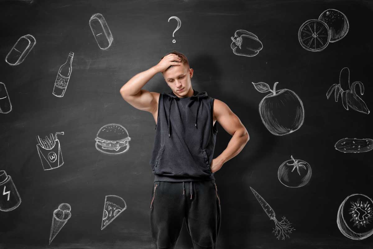 A man thinking which food to choose